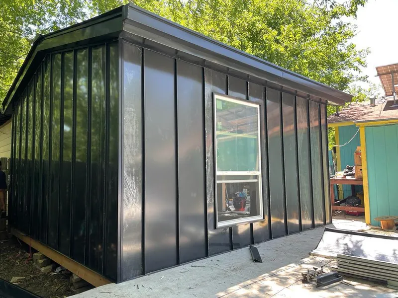 Black standing seam metal wall panels for Metal Roof Installation in Hialeah